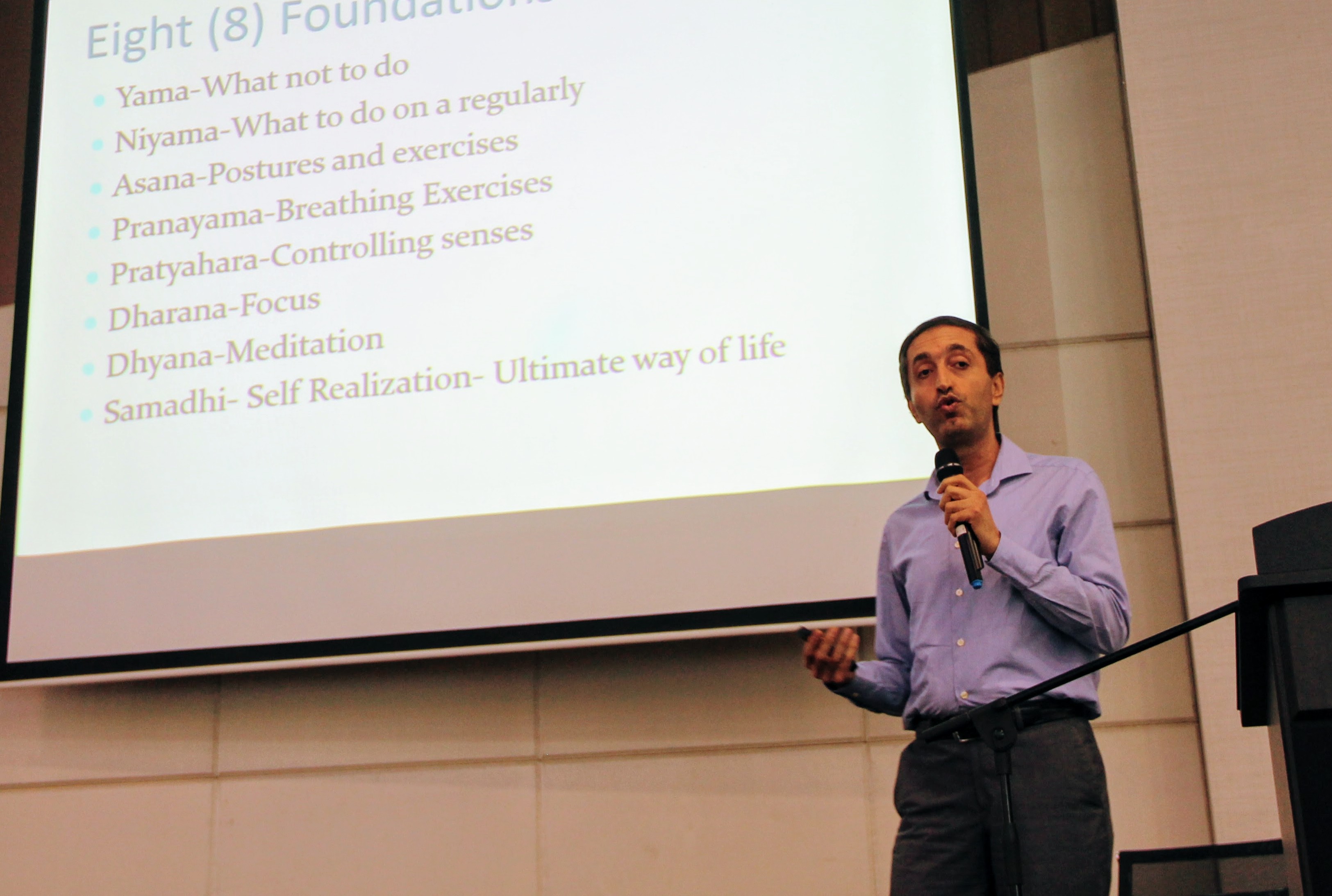 Mohammed speaking on Yoga at the CRS and Tax Talk