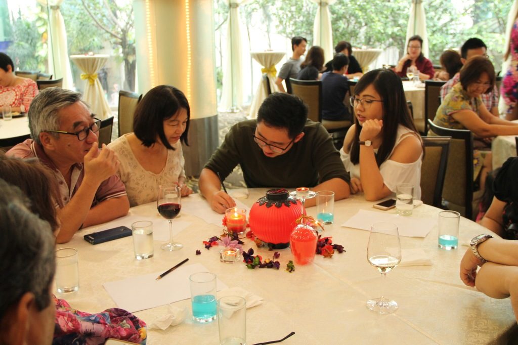 Attendees hard at work completing their Chinese zodiac animals