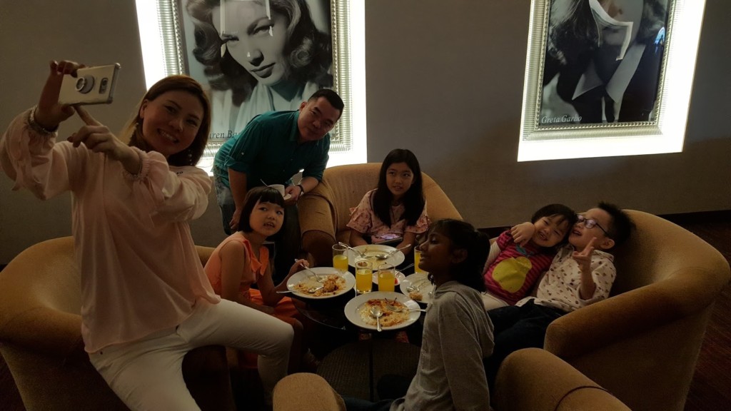 Our team members having a good time with the kids.